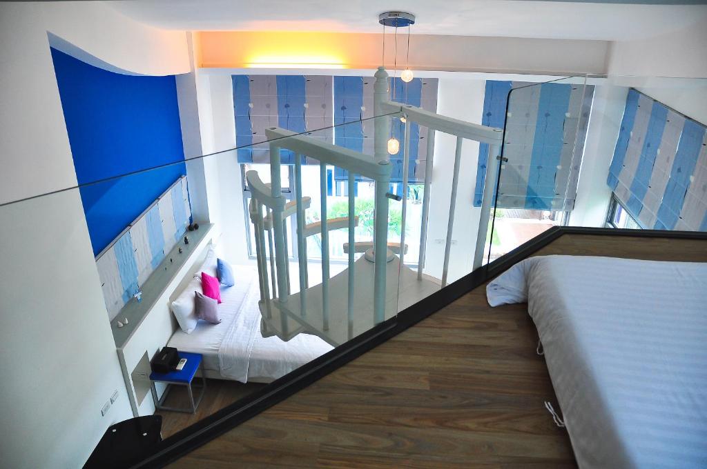 Postel nebo postele na pokoji v ubytování Hai Pu B&B