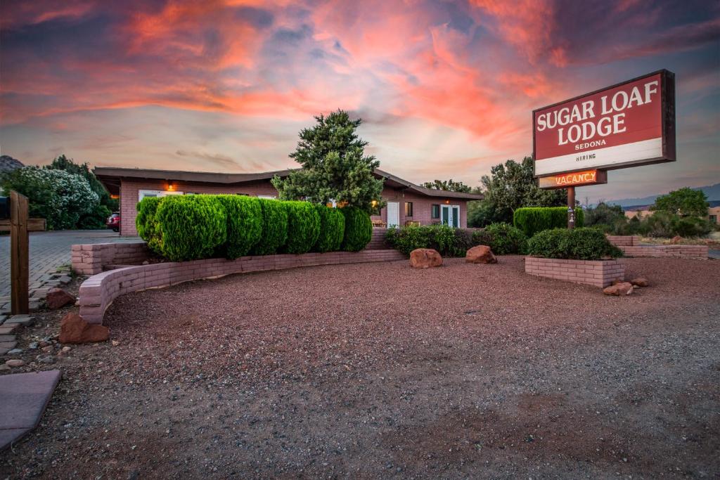 a sign for a signlor lord lodge in front of a house at Sugar Loaf Lodge in Sedona