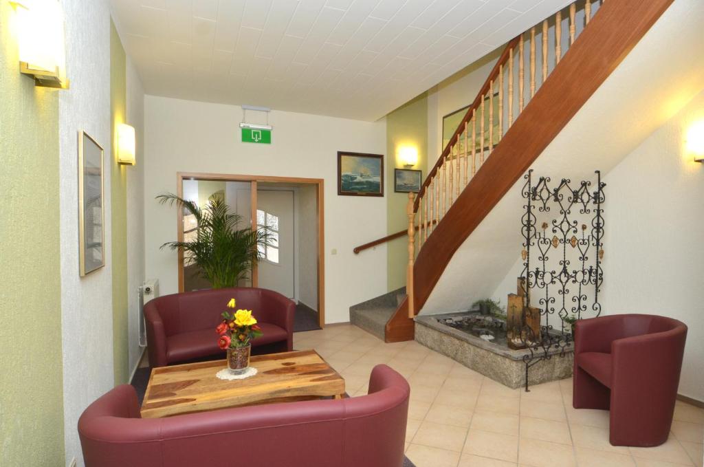Posezení v ubytování Land-Hotel Am Wald Garni
