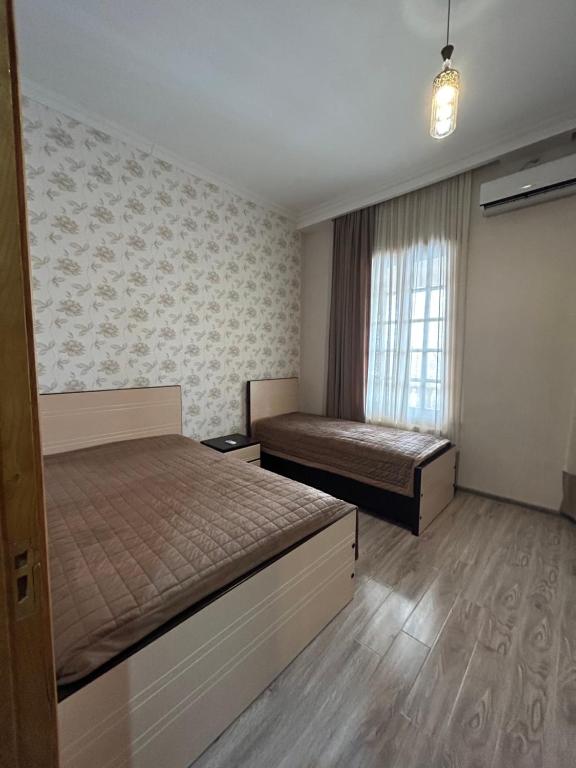 Postel nebo postele na pokoji v ubytování Medea Guest House