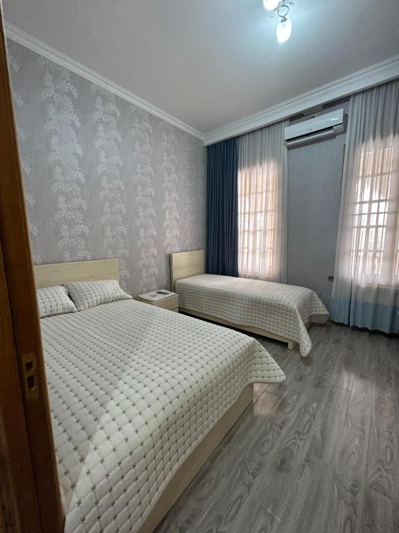 Postel nebo postele na pokoji v ubytování Medea Guest House