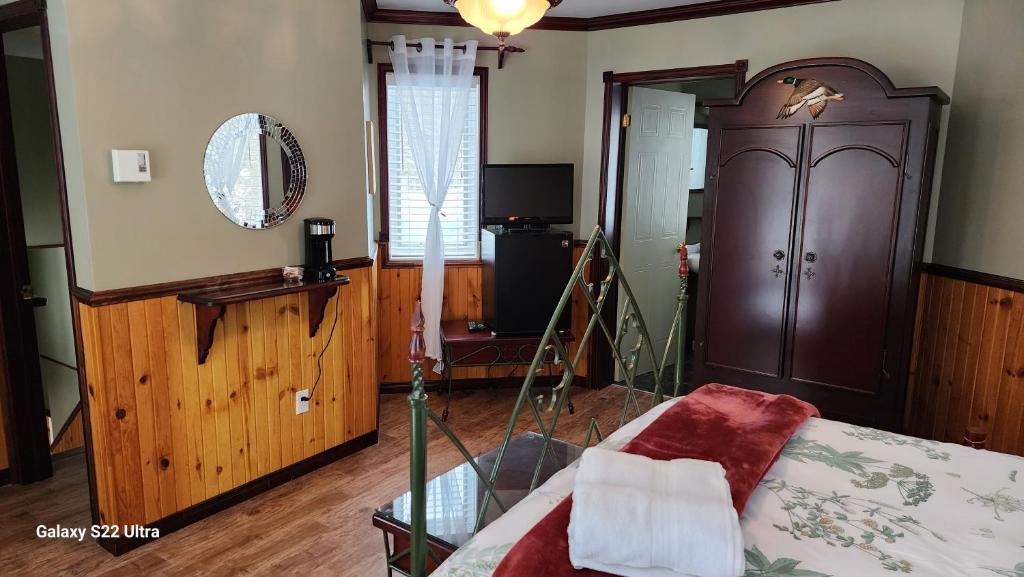 Postel nebo postele na pokoji v ubytování Domaine Rivière Sacacomie