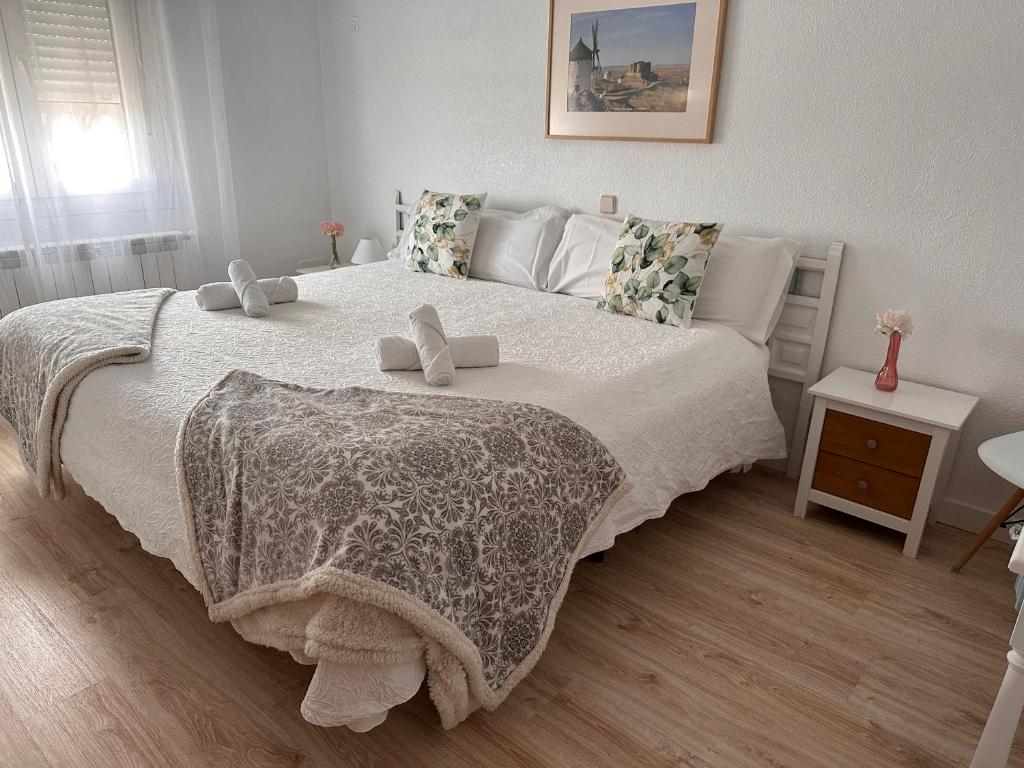 Postel nebo postele na pokoji v ubytování Hotel Consuegra