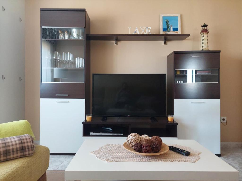 Televízia a/alebo spoločenská miestnosť v ubytovaní O Recuncho de Macías