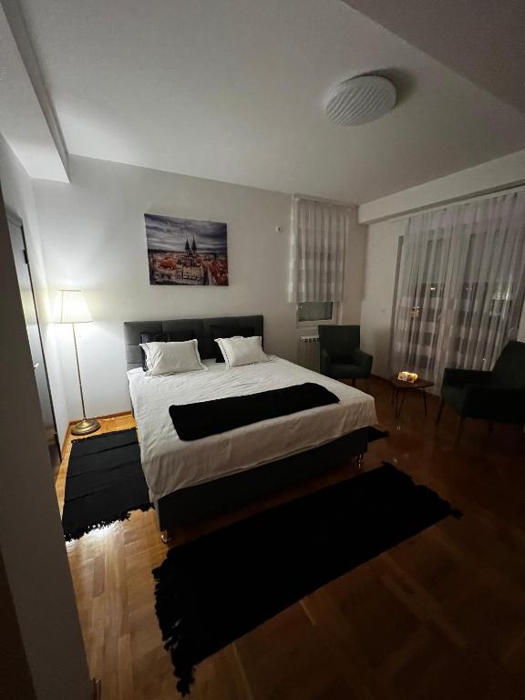 Postel nebo postele na pokoji v ubytování Biser