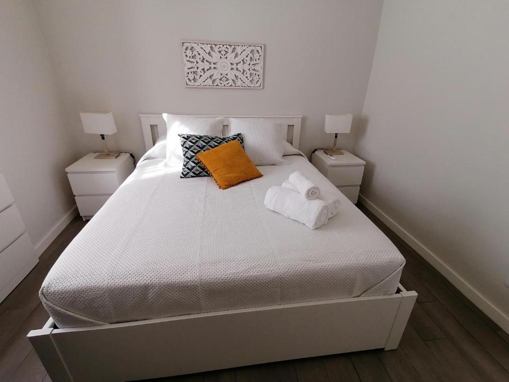 Postel nebo postele na pokoji v ubytování Miragaia Star Apartments
