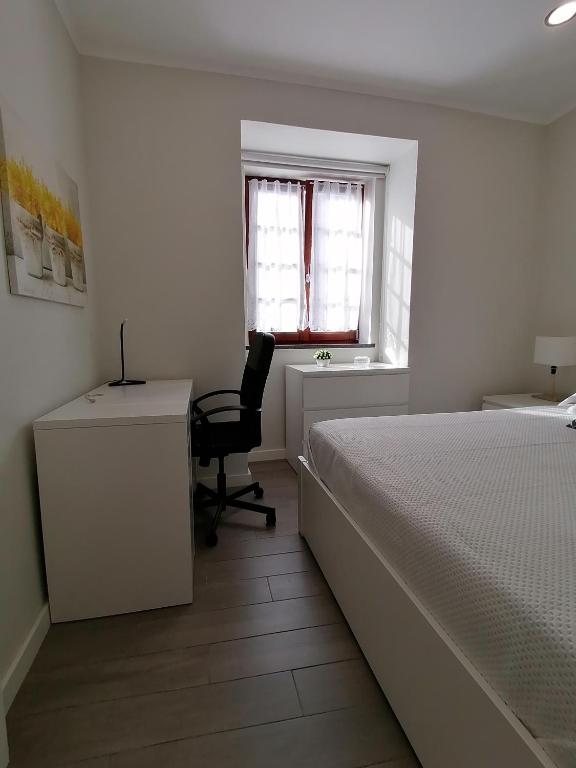 Postel nebo postele na pokoji v ubytování Miragaia Star Apartments