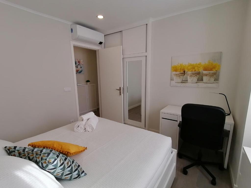 Postel nebo postele na pokoji v ubytování Miragaia Star Apartments