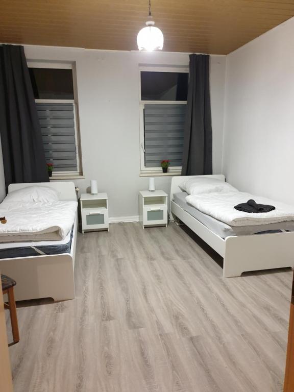 Katil atau katil-katil dalam bilik di FeWo Nina 3 - Monteurwohnung