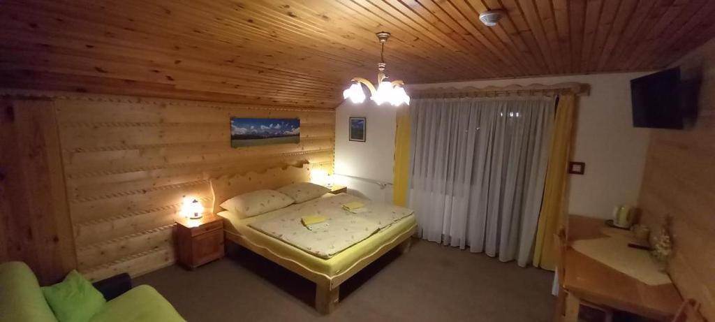 Postel nebo postele na pokoji v ubytování ASPEN