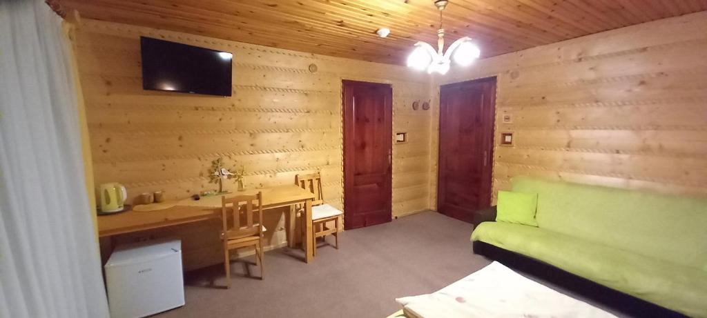TV a/nebo společenská místnost v ubytování ASPEN