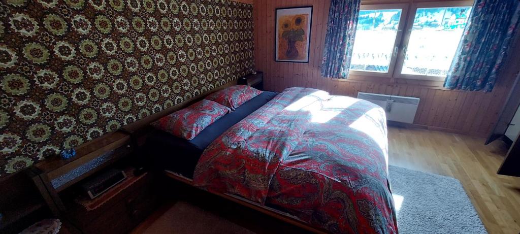 Postel nebo postele na pokoji v ubytování Walser Chalet Casa Paterna