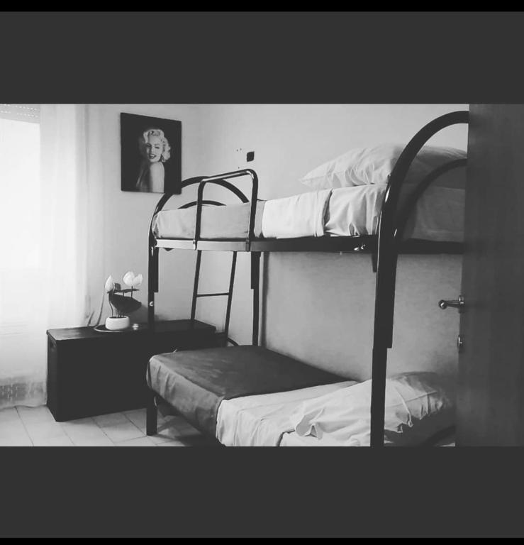 Postel nebo postele na pokoji v ubytování Vatican Giuliana Apartment 38