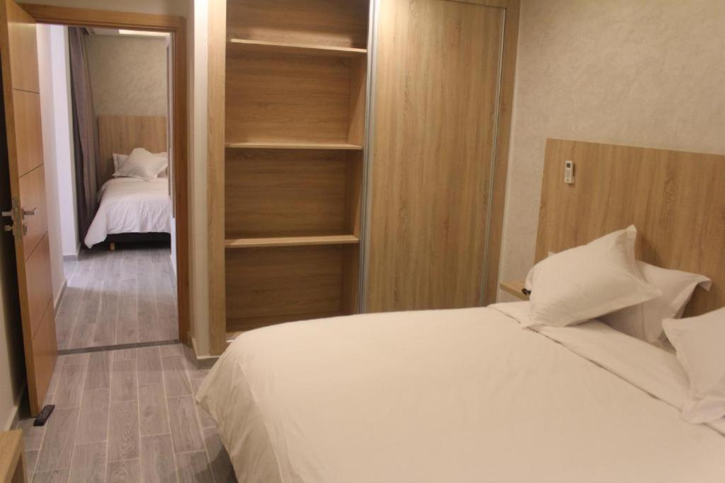 Postel nebo postele na pokoji v ubytování HOTEL CAFE PALAIS SALAM , Beni Mellal