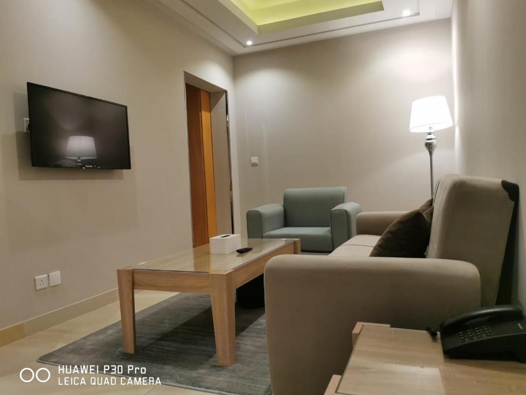 TV a/nebo společenská místnost v ubytování رام جده للشقق المخدومه Ram Jeddah