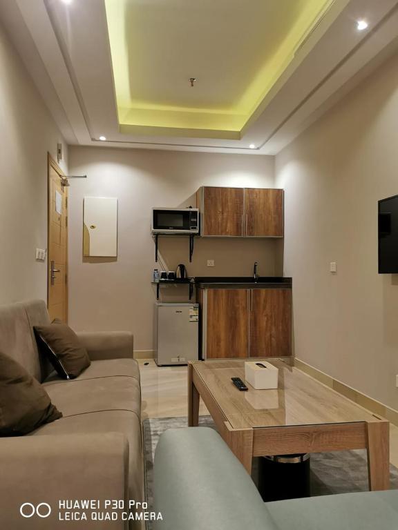 TV a/nebo společenská místnost v ubytování رام جده للشقق المخدومه Ram Jeddah
