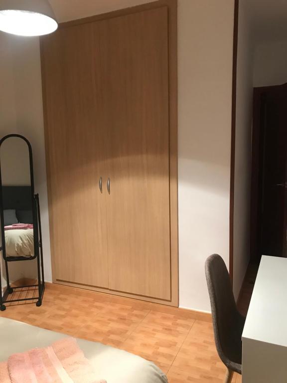 A bed or beds in a room at Vivienda con fines turísticos ALMA