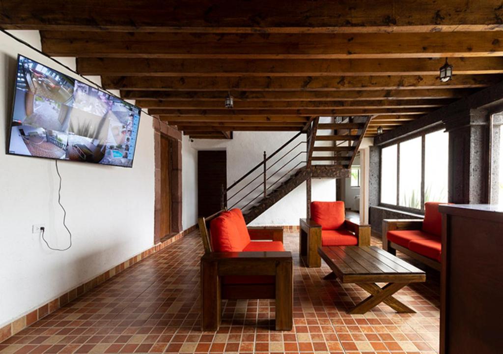 Posezení v ubytování Hotel & Temazcal Hacienda Maxthá