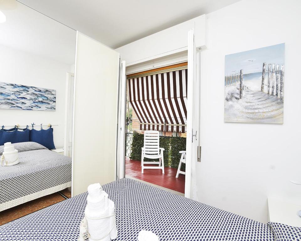 Postel nebo postele na pokoji v ubytování Appartamento Rapallo Liguria Maria Jose