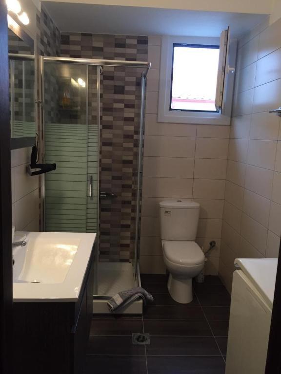 Koupelna v ubytování Mila House