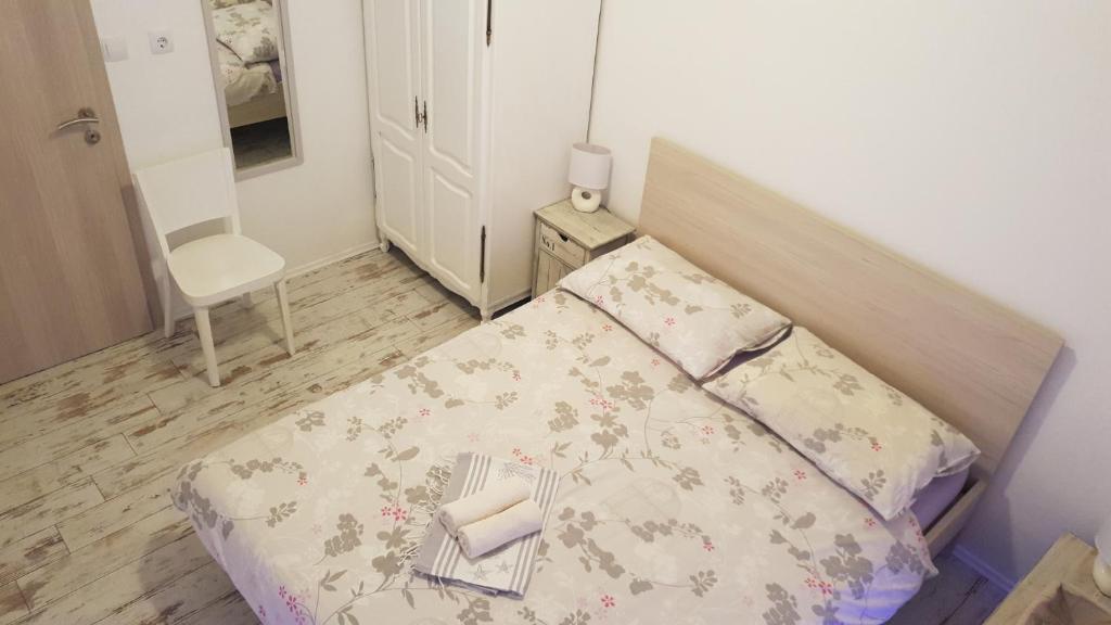 Postel nebo postele na pokoji v ubytování Apartment CONTE