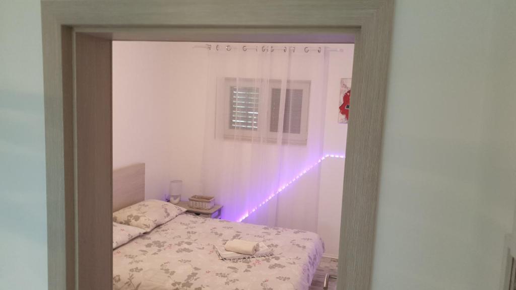Postel nebo postele na pokoji v ubytování Apartment CONTE