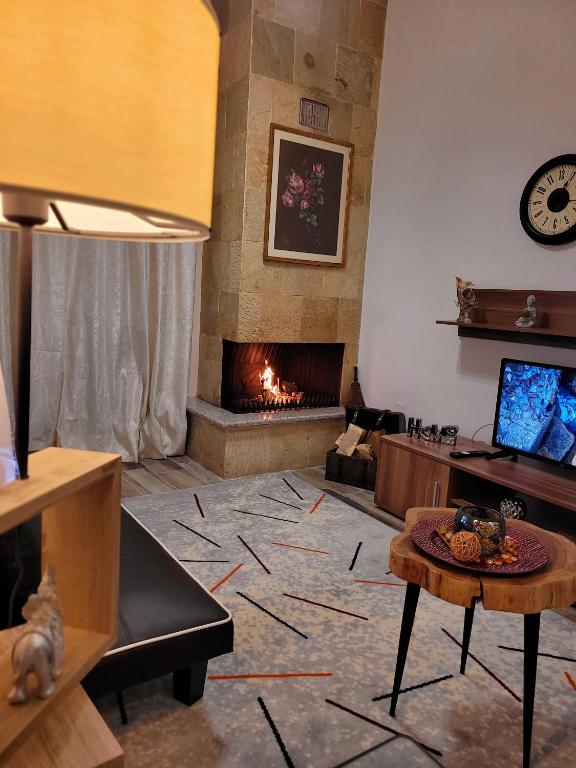 TV a/nebo společenská místnost v ubytování MarGe Apt