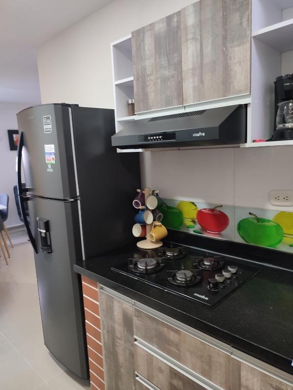 Kuchyň nebo kuchyňský kout v ubytování 302-Cómodo y moderno apartamento de 2 habitaciones en la mejor zona céntrica de Ibagué