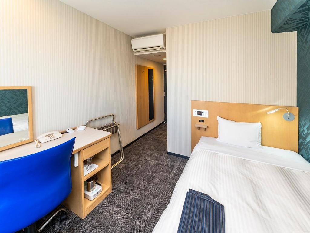 Postel nebo postele na pokoji v ubytování Hotel Mark-1 Tsukuba