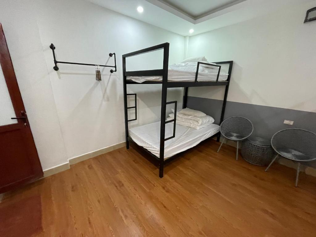 Postel nebo postele na pokoji v ubytování Flaco Hostel Sapa