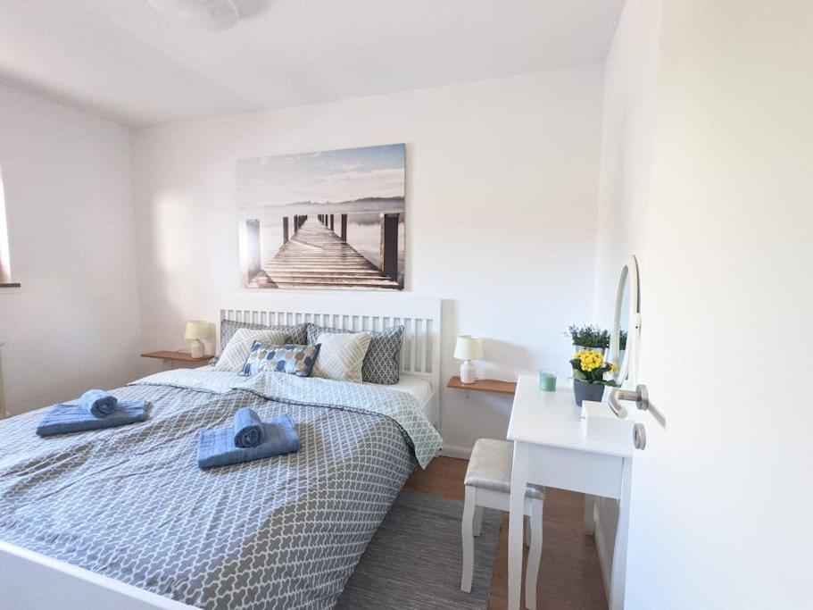 Postel nebo postele na pokoji v ubytování Ferienwohnung für 4 Gäste in Grömitz