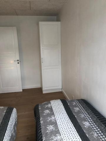 Postel nebo postele na pokoji v ubytování Bulagergaard