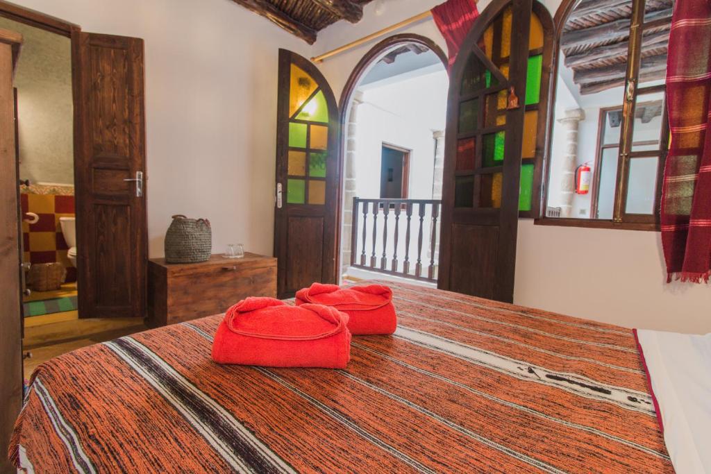 Postel nebo postele na pokoji v ubytování Riad Dar Abi