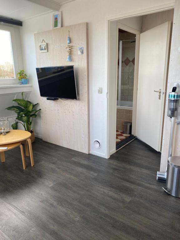 TV a/nebo společenská místnost v ubytování B&B Zonnedael