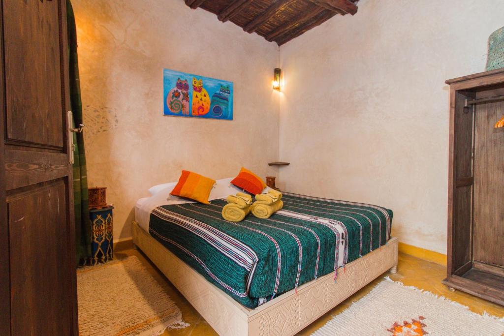 Postel nebo postele na pokoji v ubytování Riad Dar Abi