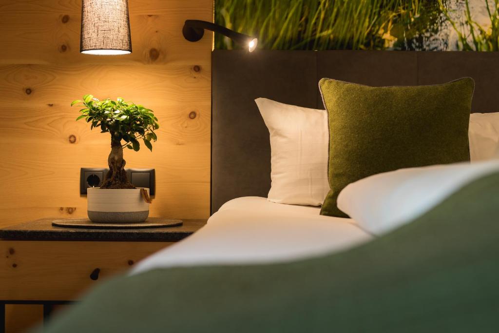 Postel nebo postele na pokoji v ubytování Aktiv Panoramahotel Daniel