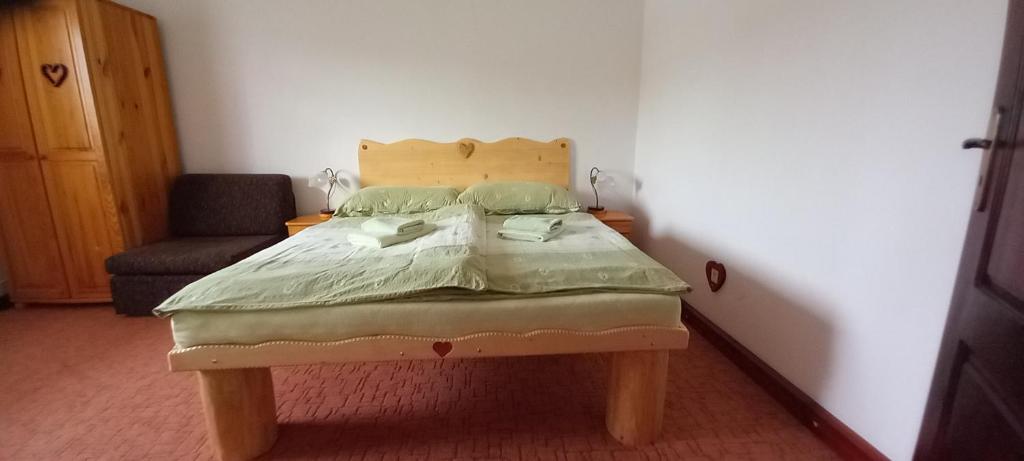 Postel nebo postele na pokoji v ubytování ASPEN