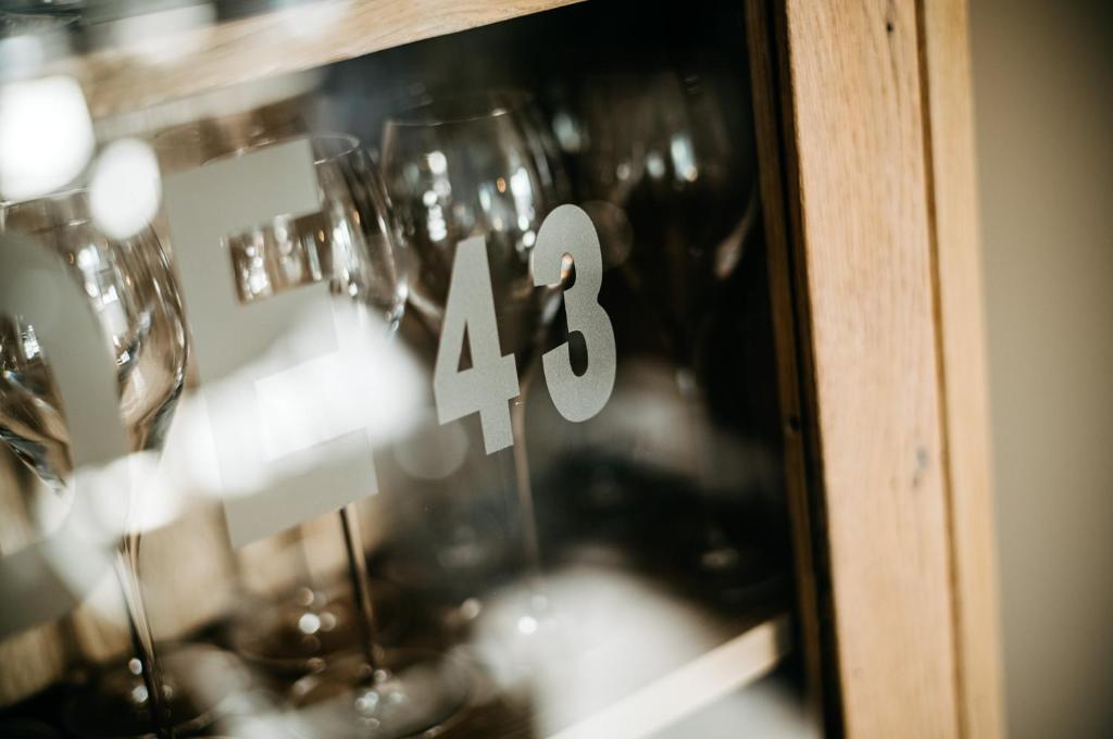 a group of wine glasses with the number on them at Seaside 43 in Sankt Peter-Ording