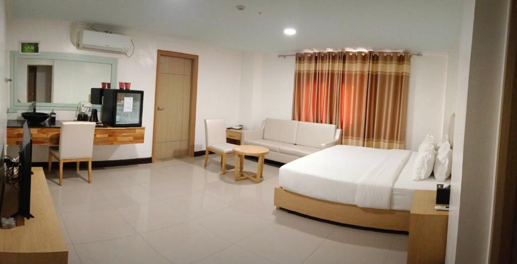 Kuchyň nebo kuchyňský kout v ubytování PUNTA CLARK HOTEL