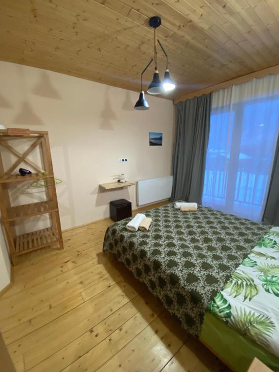 Postel nebo postele na pokoji v ubytování Sana Guest House