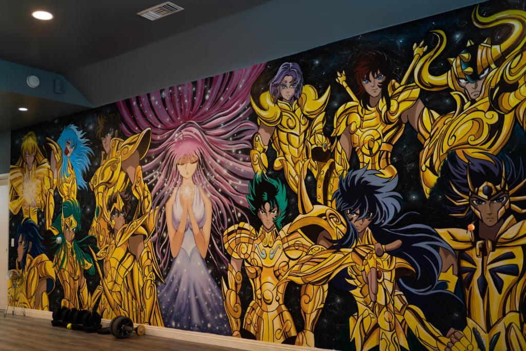 um mural na parede de um quarto em 2000 sq ft An Anime Fan's Dream Workout Studio em Arcadia