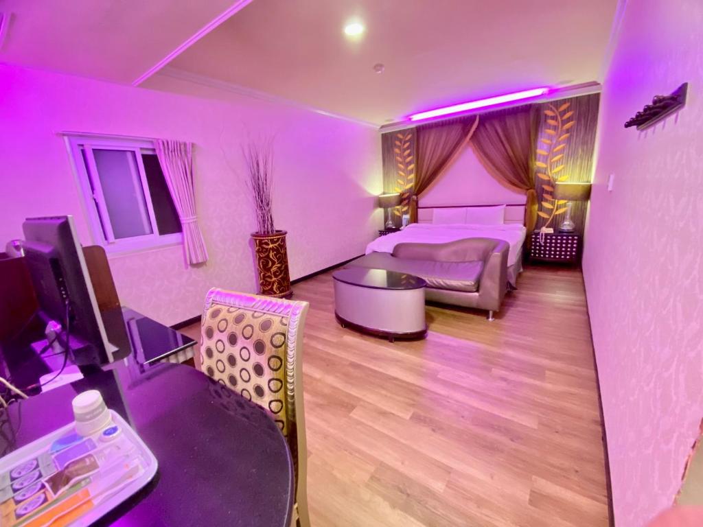Posezení v ubytování Huang Xing Motel