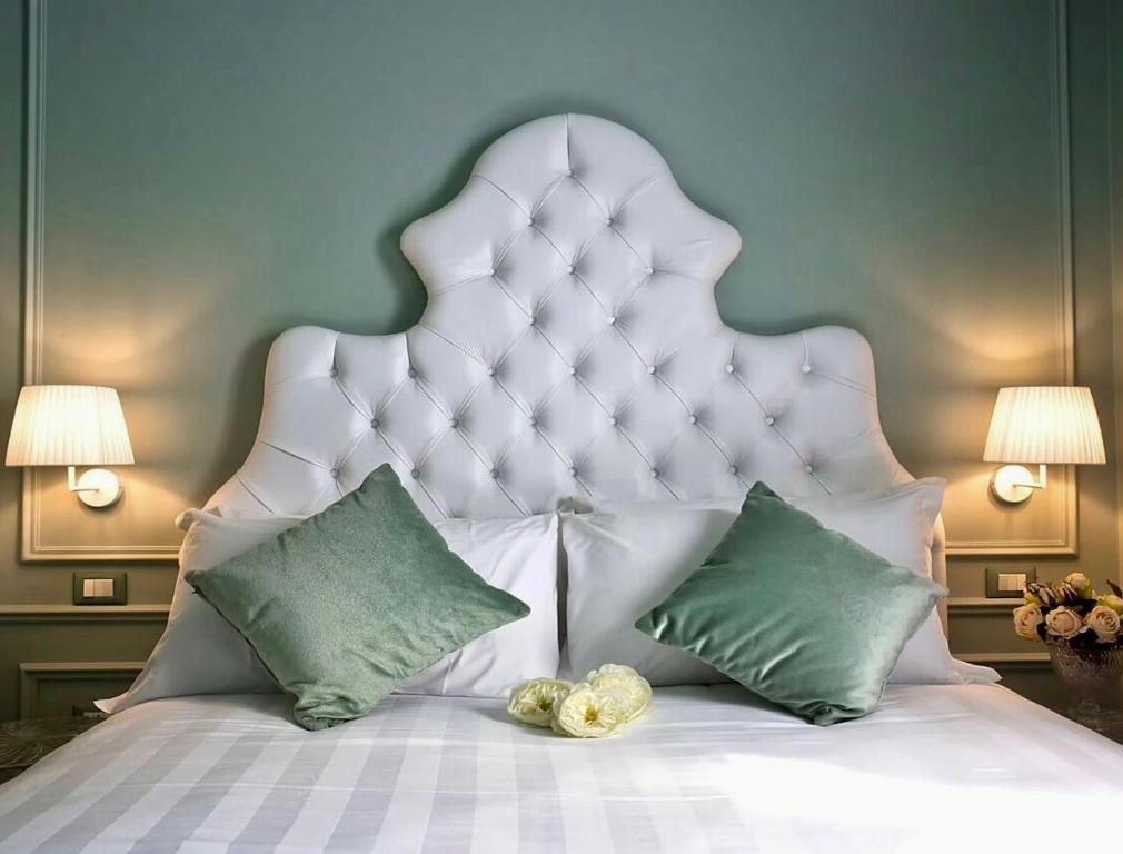 Postel nebo postele na pokoji v ubytování Aquamare, boutique b&b