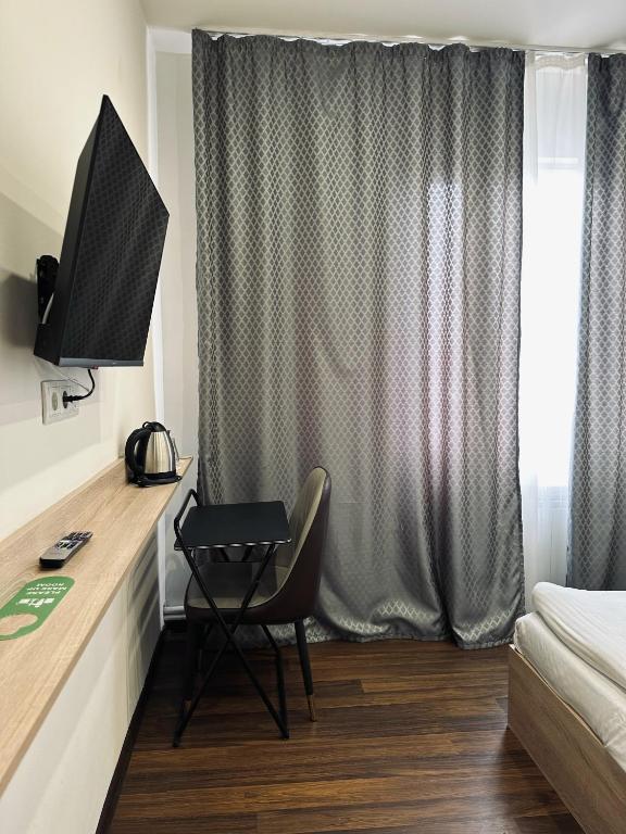 TV a/nebo společenská místnost v ubytování NAVA Hotel Yerevan