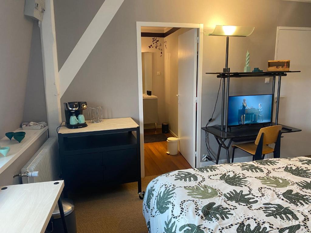 Postel nebo postele na pokoji v ubytování Chambre Archi
