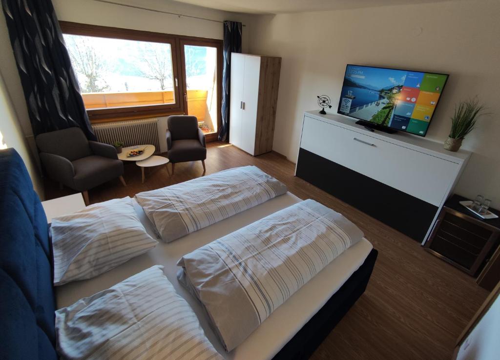 TV a/nebo společenská místnost v ubytování Pension zum Mühlrad