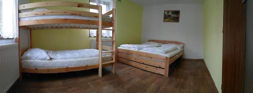 Postel nebo postele na pokoji v ubytování Ubytování Macků