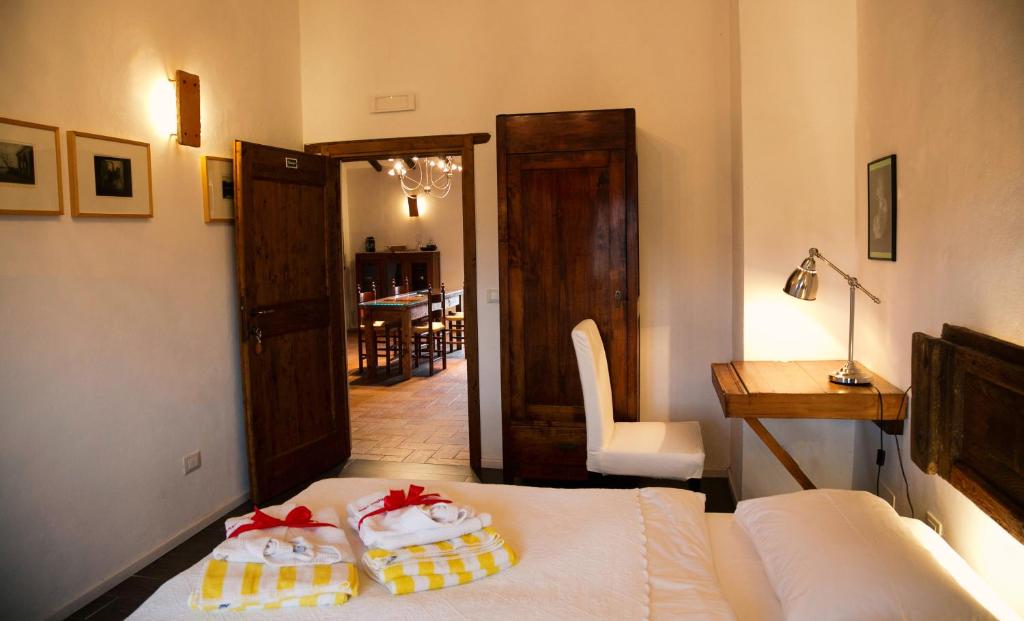 Postel nebo postele na pokoji v ubytování SommaVilla B&B