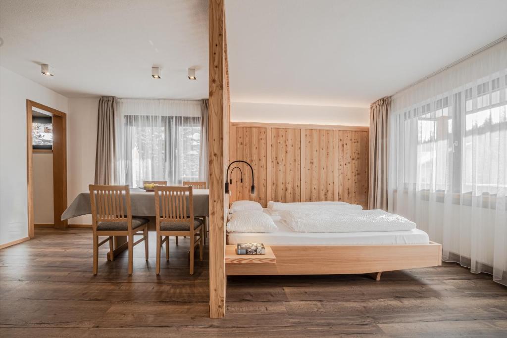 Postel nebo postele na pokoji v ubytování Appartamenti Residence Ada