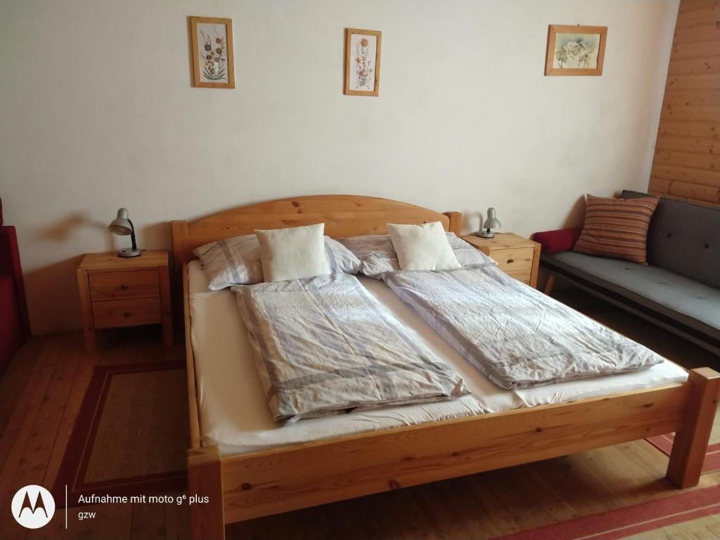 Postel nebo postele na pokoji v ubytování Rauter in Wöllan
